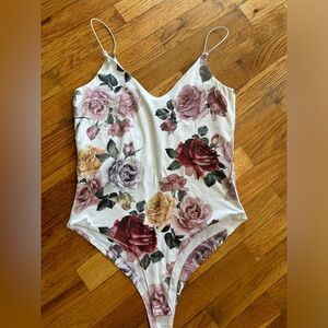 Medium floral one piece by “live in the moment”